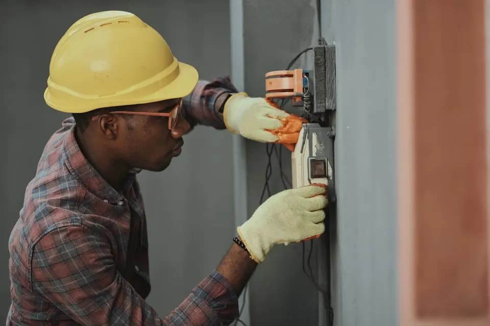Licensed electrician carrying out electrical work in a Dubai home